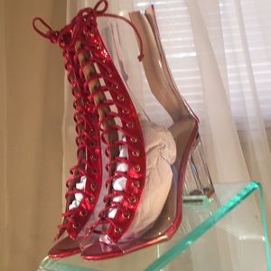 Red and clear shoe booties